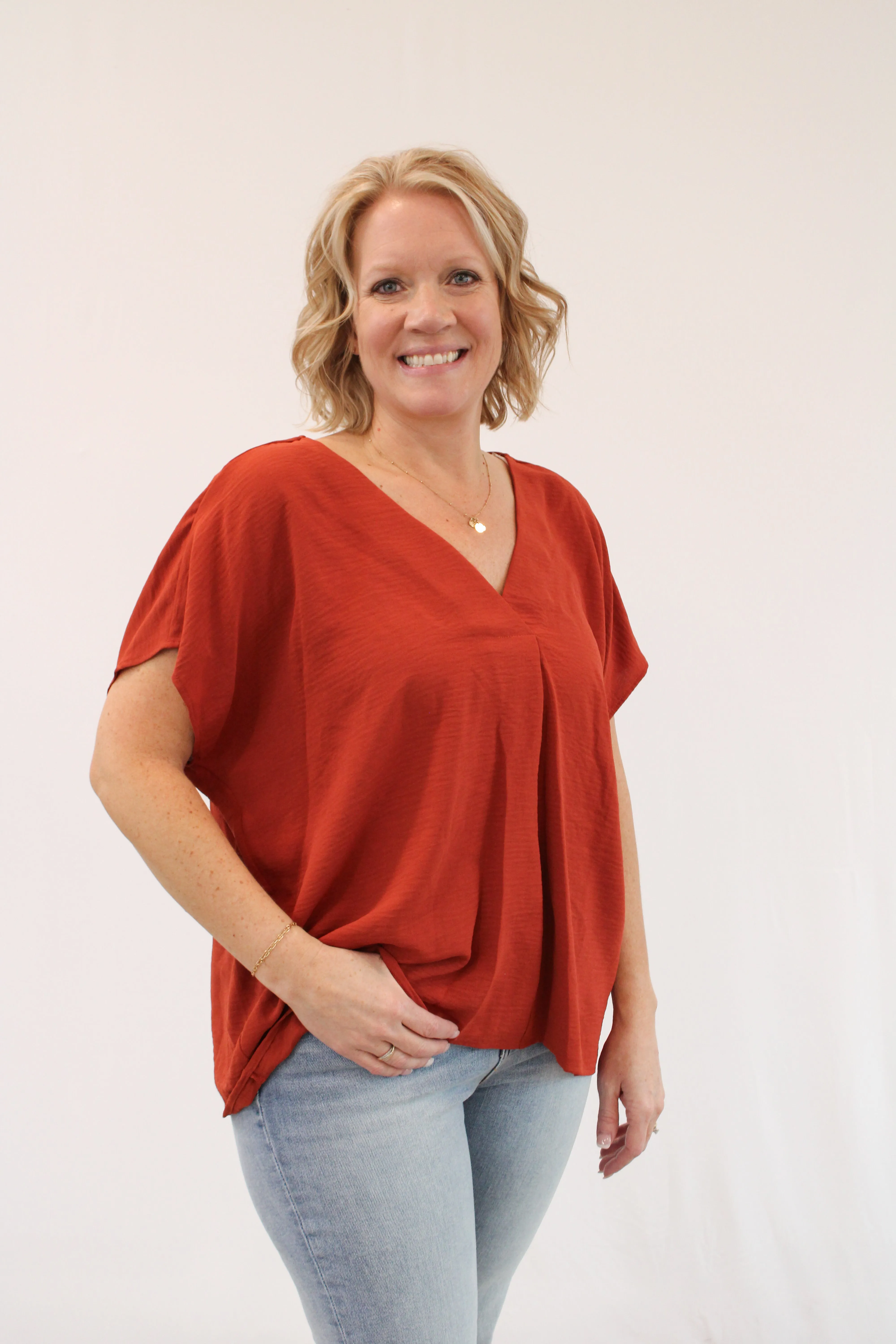 RITA DEEP V-NECK BLOUSE